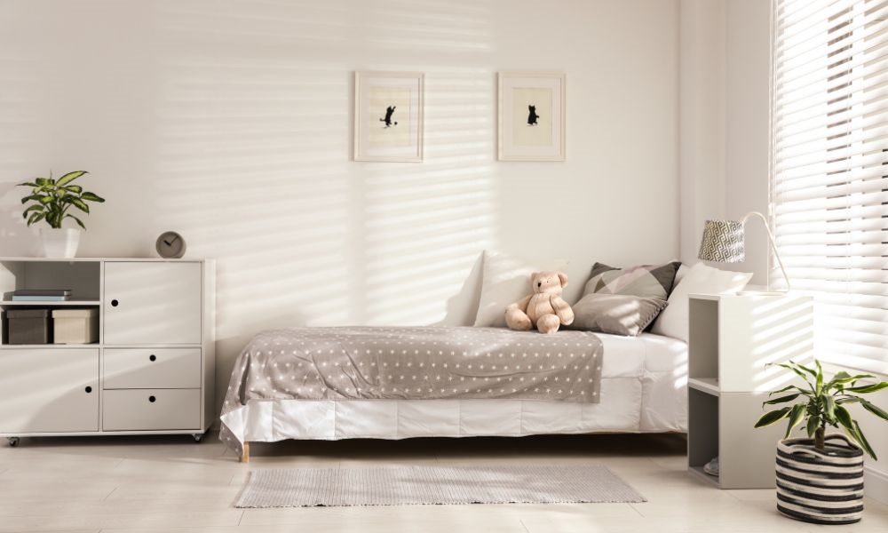 In a bedroom, two white drawers