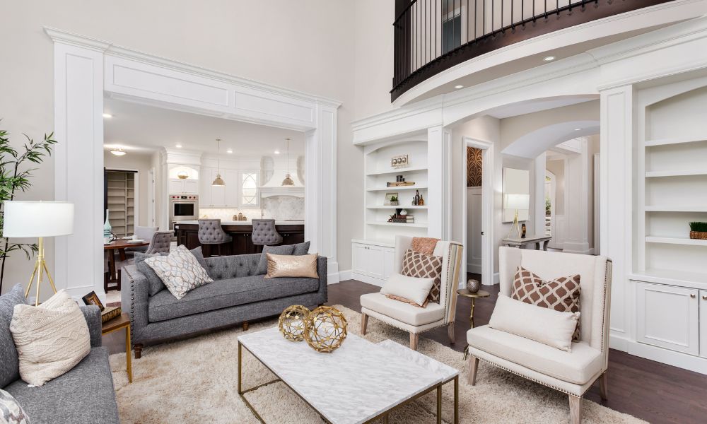 In a family room, sofa and book shelves behind