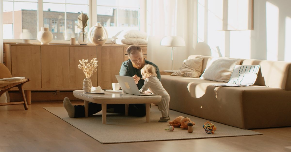 By the window, wooden living Room table with 6 chairs around